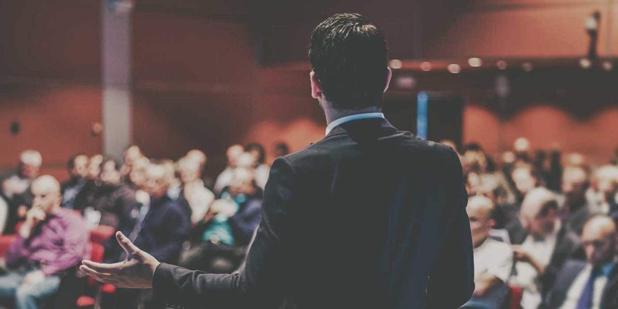 man presenting at a nonprofit conference