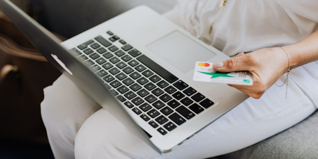 woman making online donation to a recurring giving program