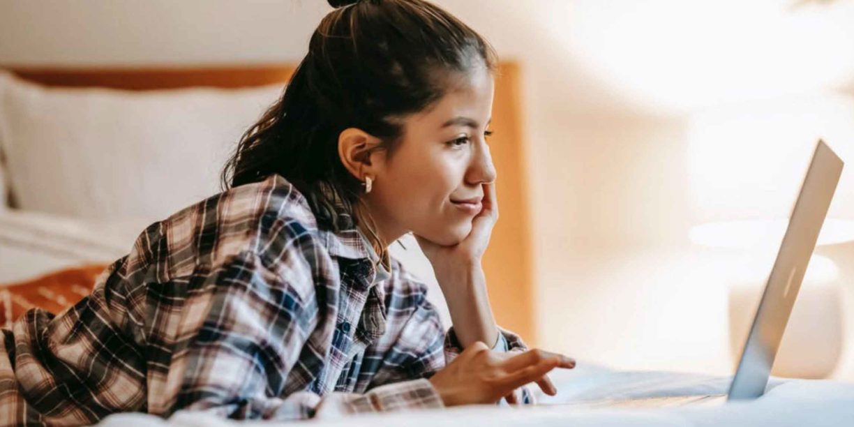 Girl typing on a computer